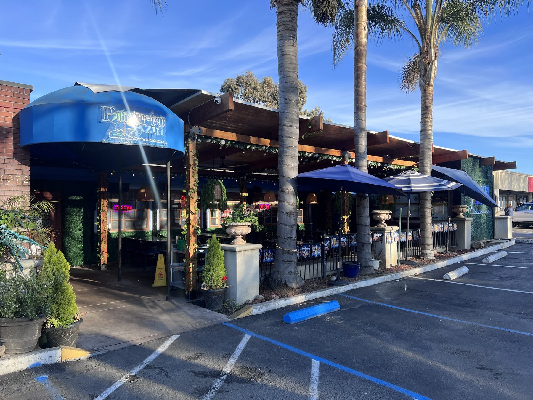 Puerto Azul Restaurant on Lincoln Avenue with its blue awnings and palm trees